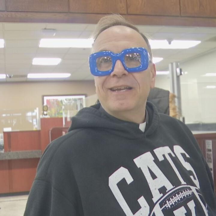 Father Jim Sichko pays utility bills at KU 1-18-24